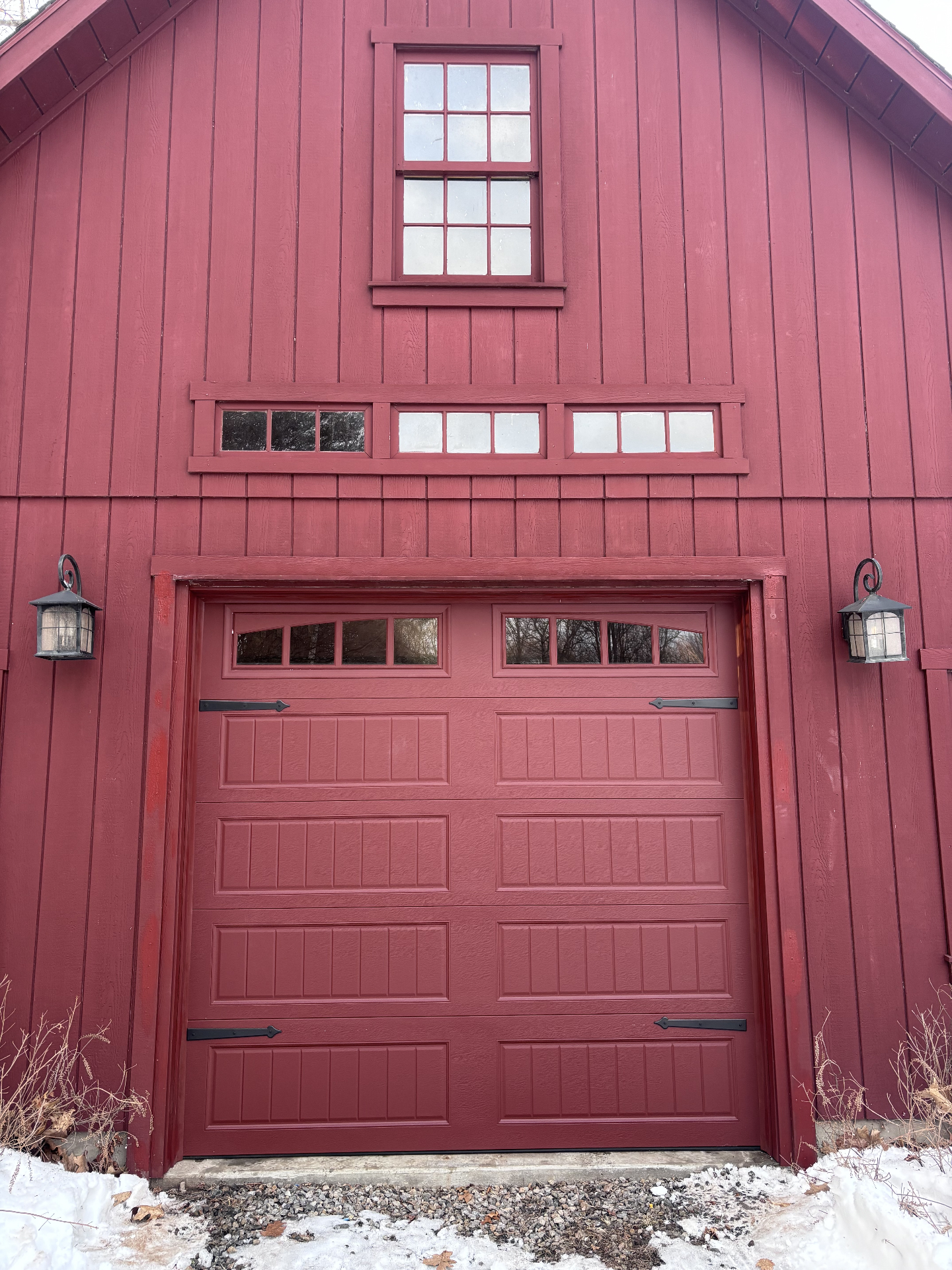 Same barn bay fitted with a matching red overhead garage door